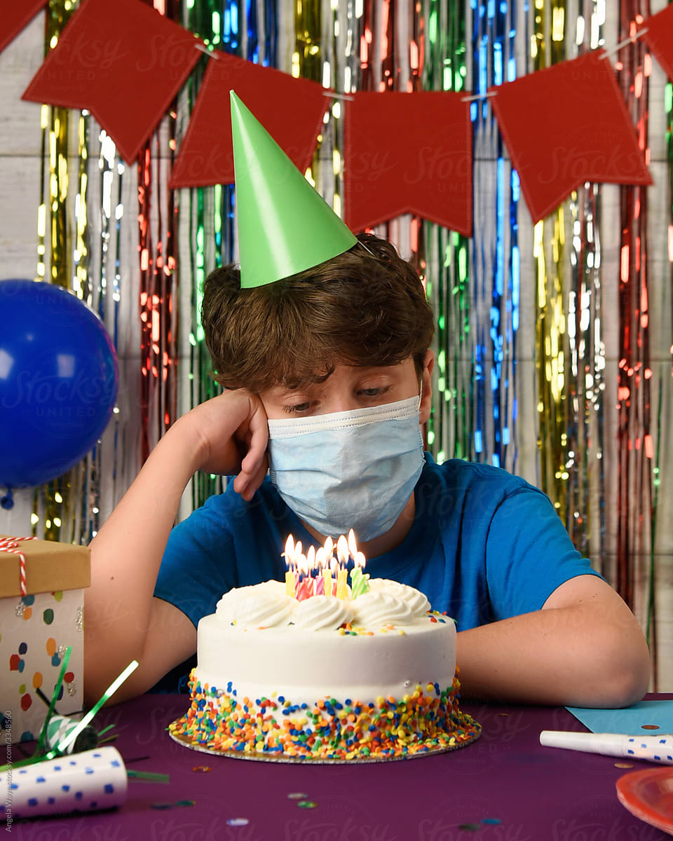 Sad Boy at Birthday with Mask