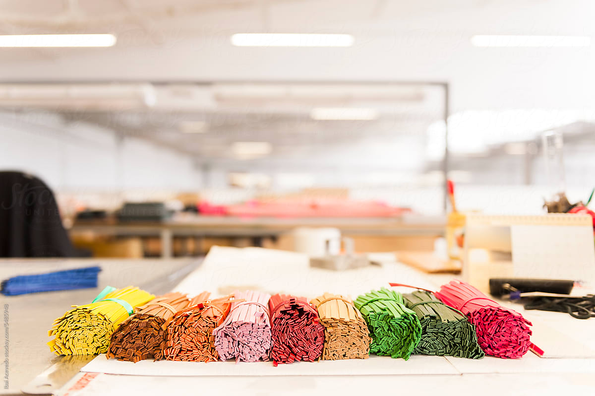 Stored colourful leather strips at factory workshop