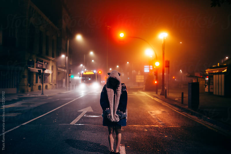 woman walking bare feet on a foggy night