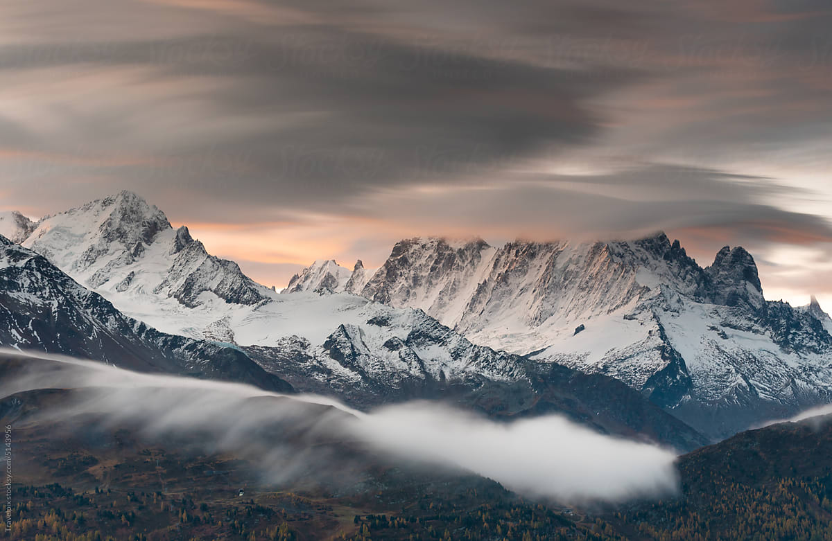 Panoramic of the Mont Blanc Massif at sunrise. Chamonix. France (vt)