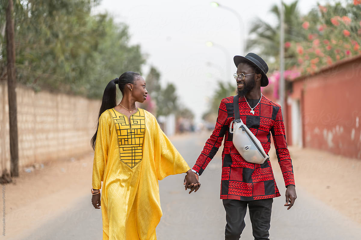 Elegantly Dressed Senegalese Couple Taking a Stroll