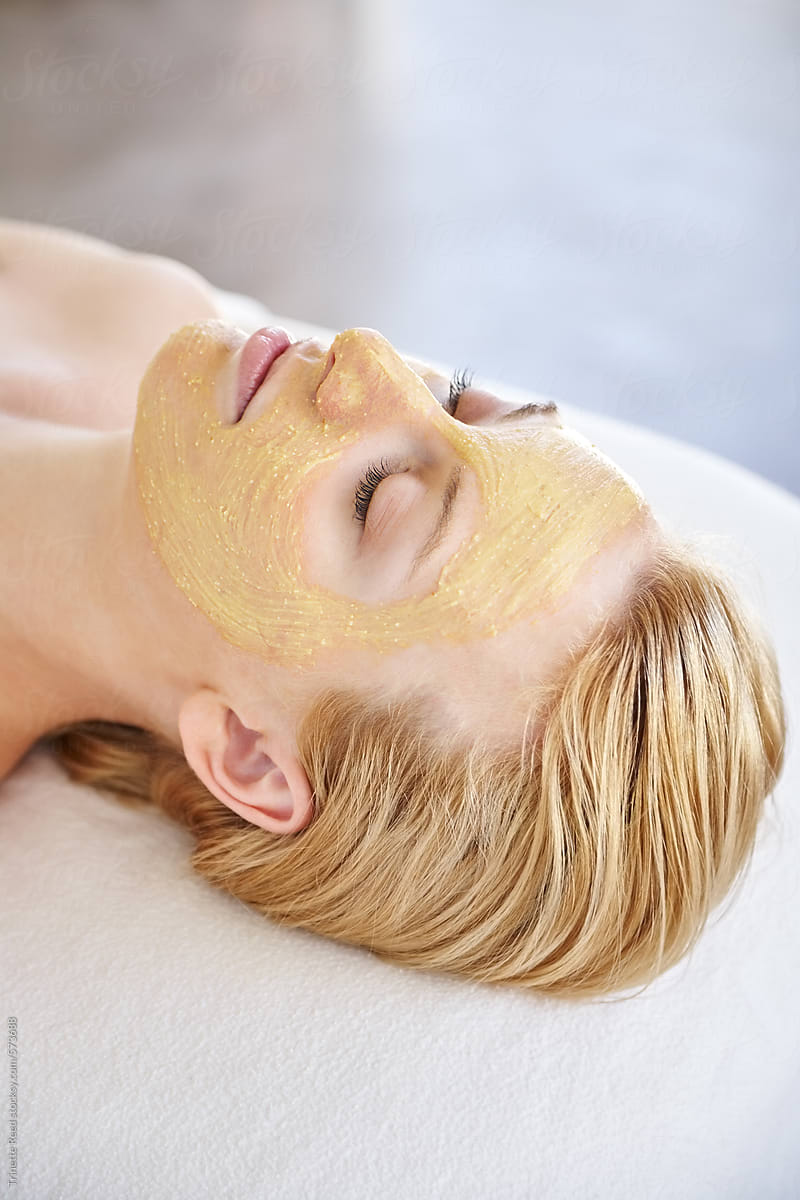 Woman getting an all natural facial at luxury spa