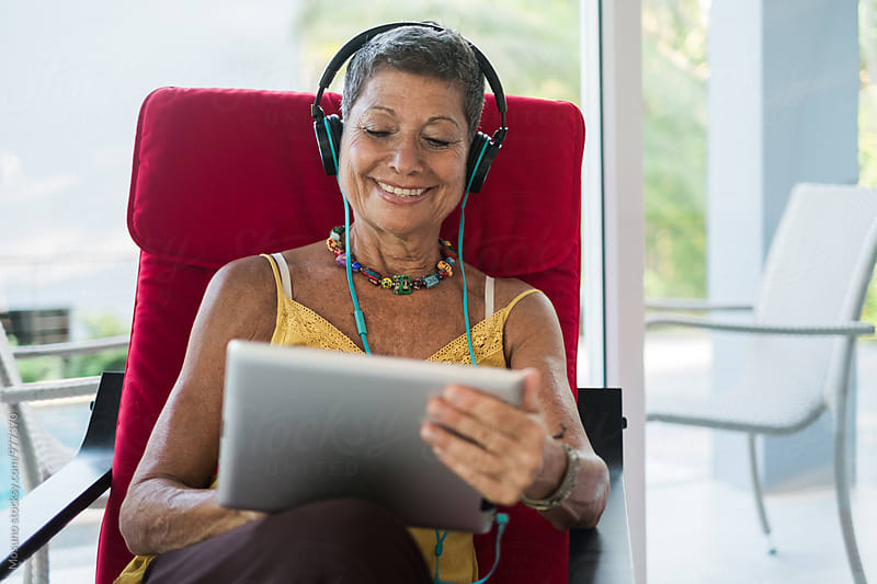 Senior Woman Listening to the Music
