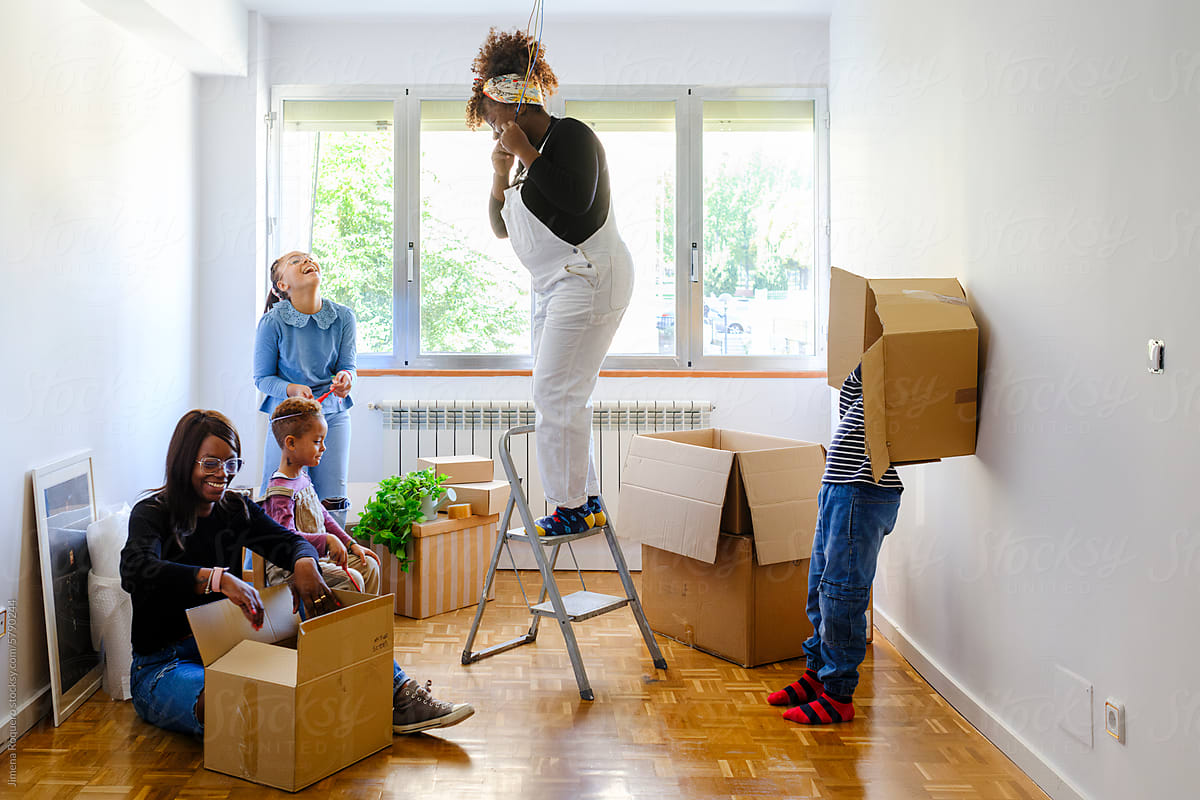 Members of Family moving in their new home