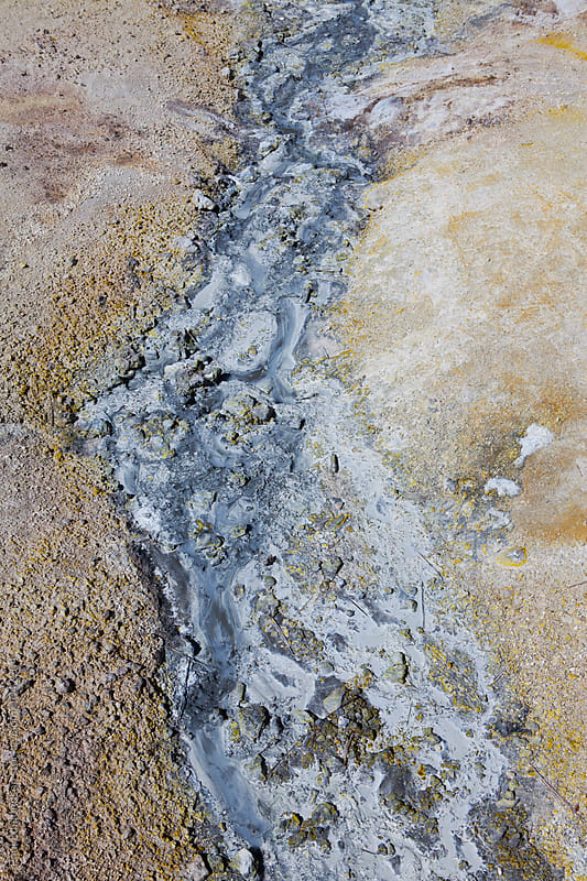 Detail of mineral deposits and stream at hot spring