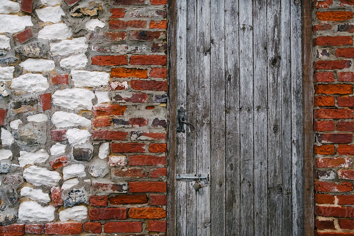 Wooden door on a boat house. Thornham, Norfolk, UK.