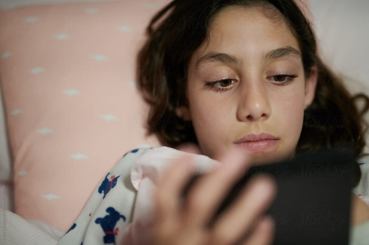 Girl Reading Ebook In Bed By Stocksy Contributor Guille Faingold Stocksy 