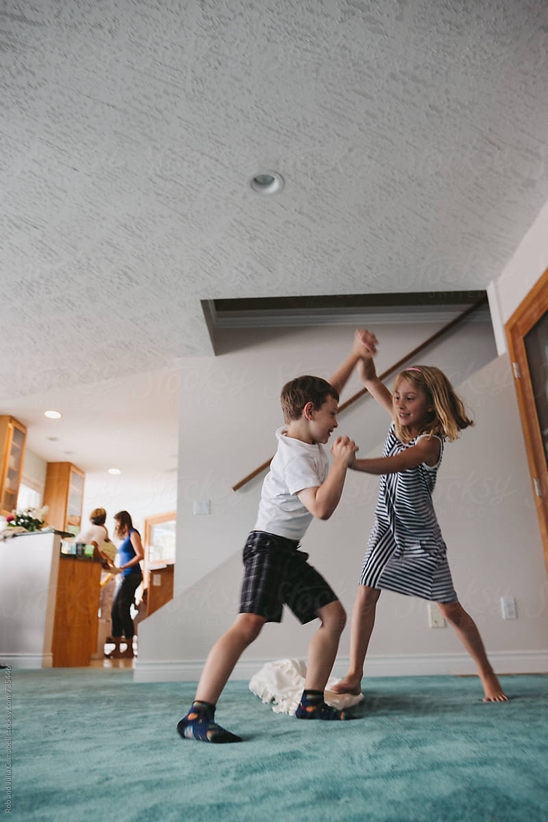 Brother And Sister Play Fighting Inside By Ameris Photography Inc