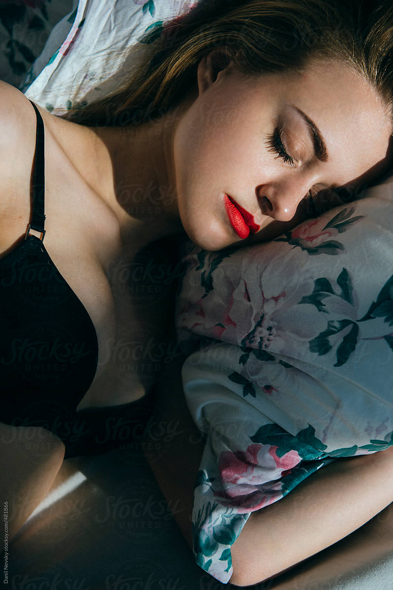 A Collection Of Bras Laying On Bed by Stocksy Contributor