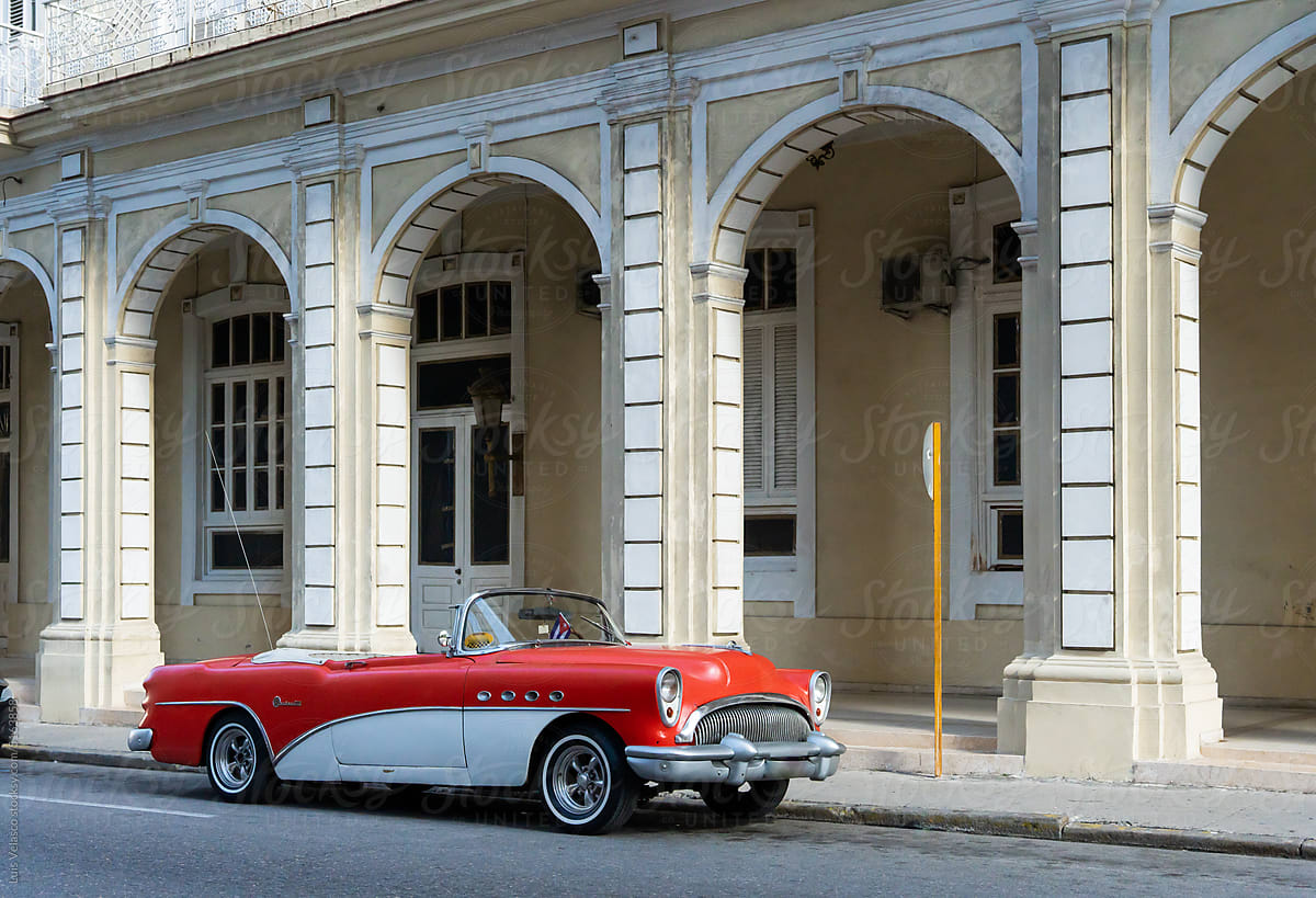 Vintage Red Car Parked In La Havana.