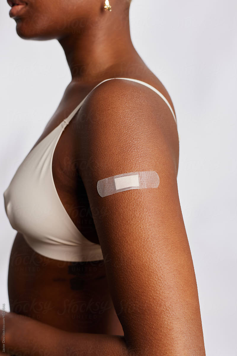 Woman with vaccine patch