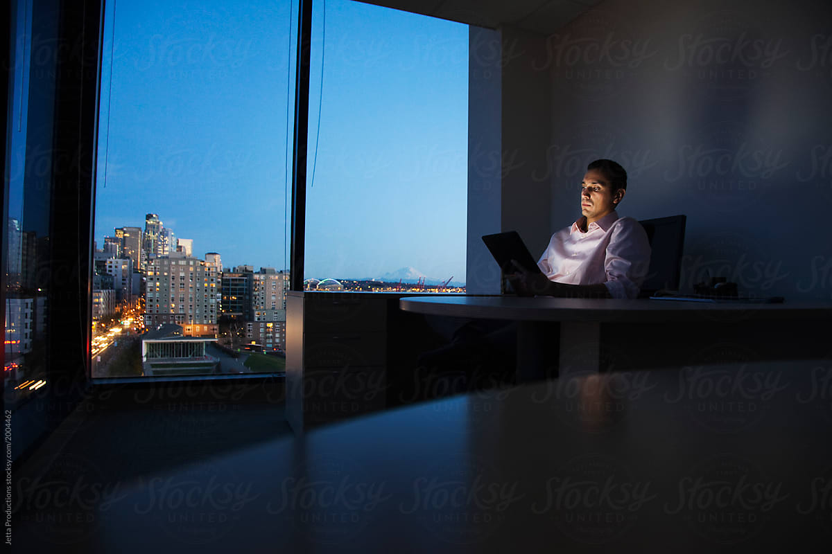 Male executive working at night