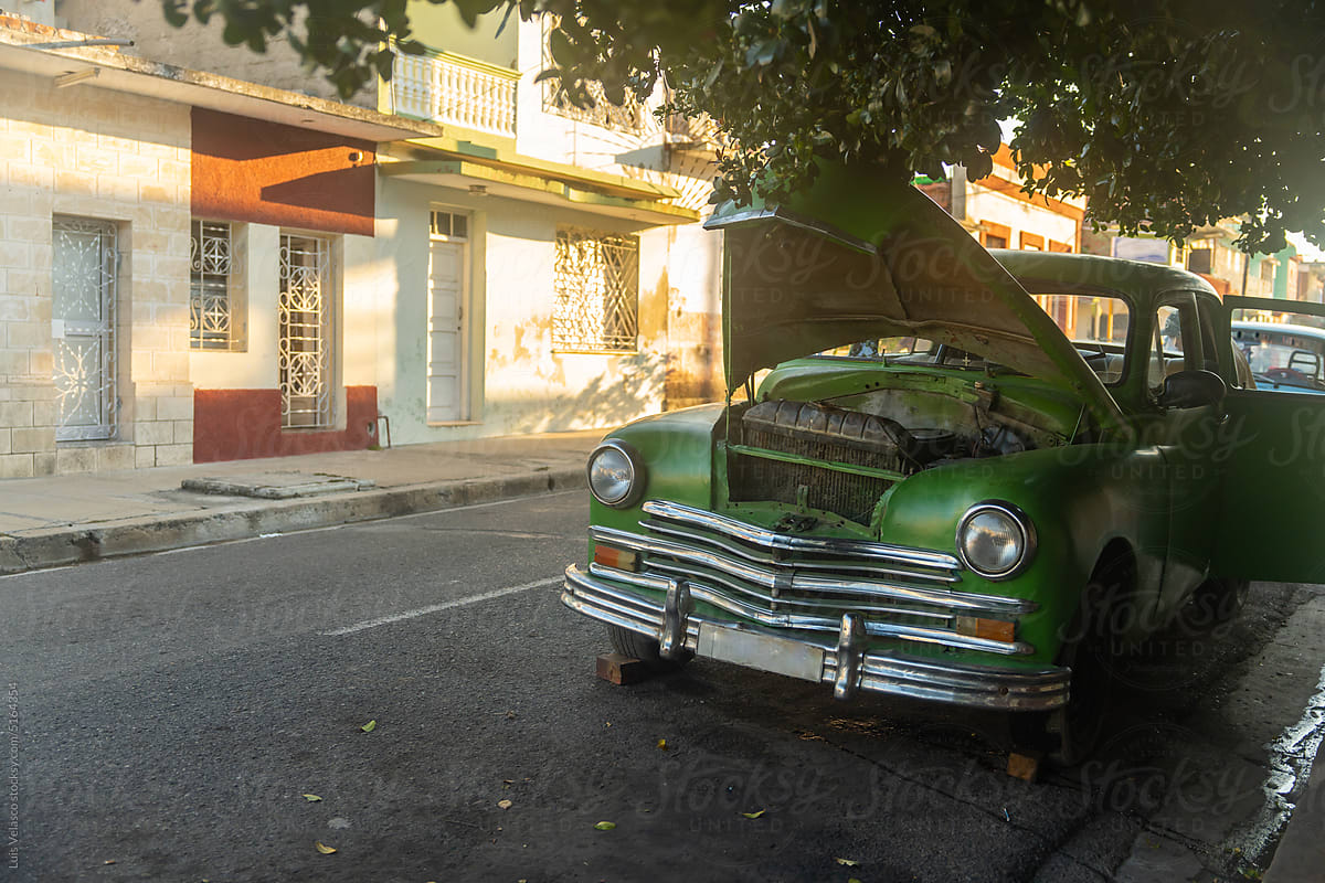 Old Green Car Stopped On Street In Cienfuegos City