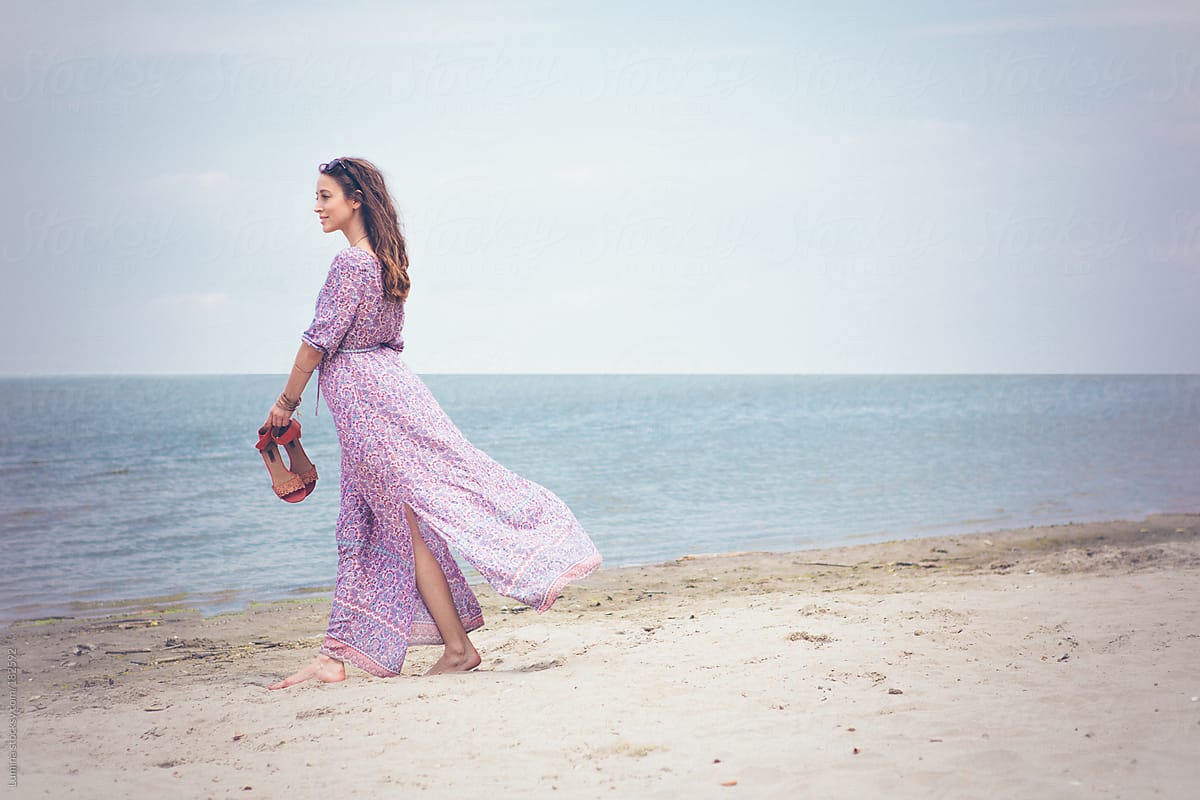 Woman Having A Walk On The Beach By Stocksy Contributor Lumina Stocksy