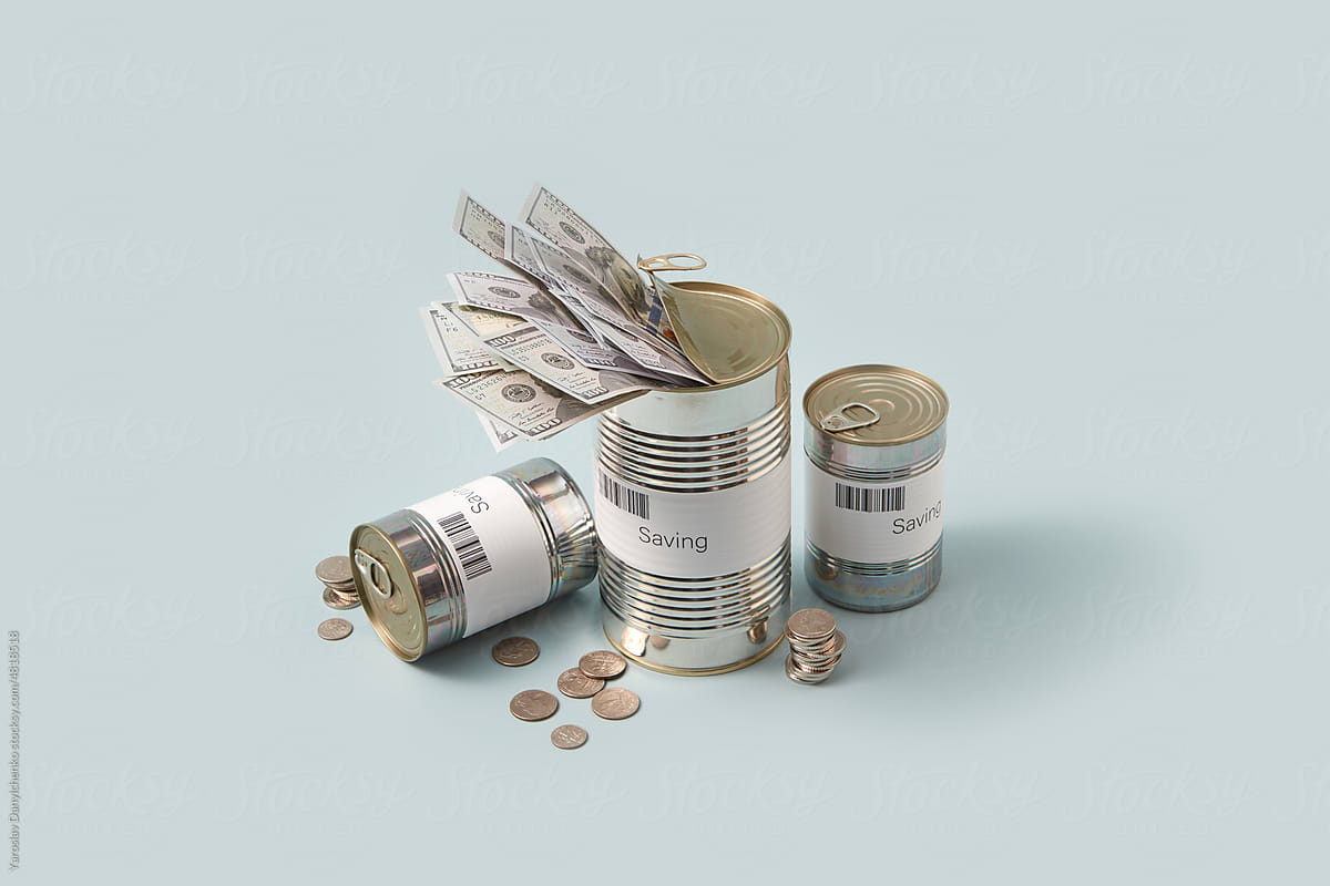 Dollars in cans with inscription Savings.