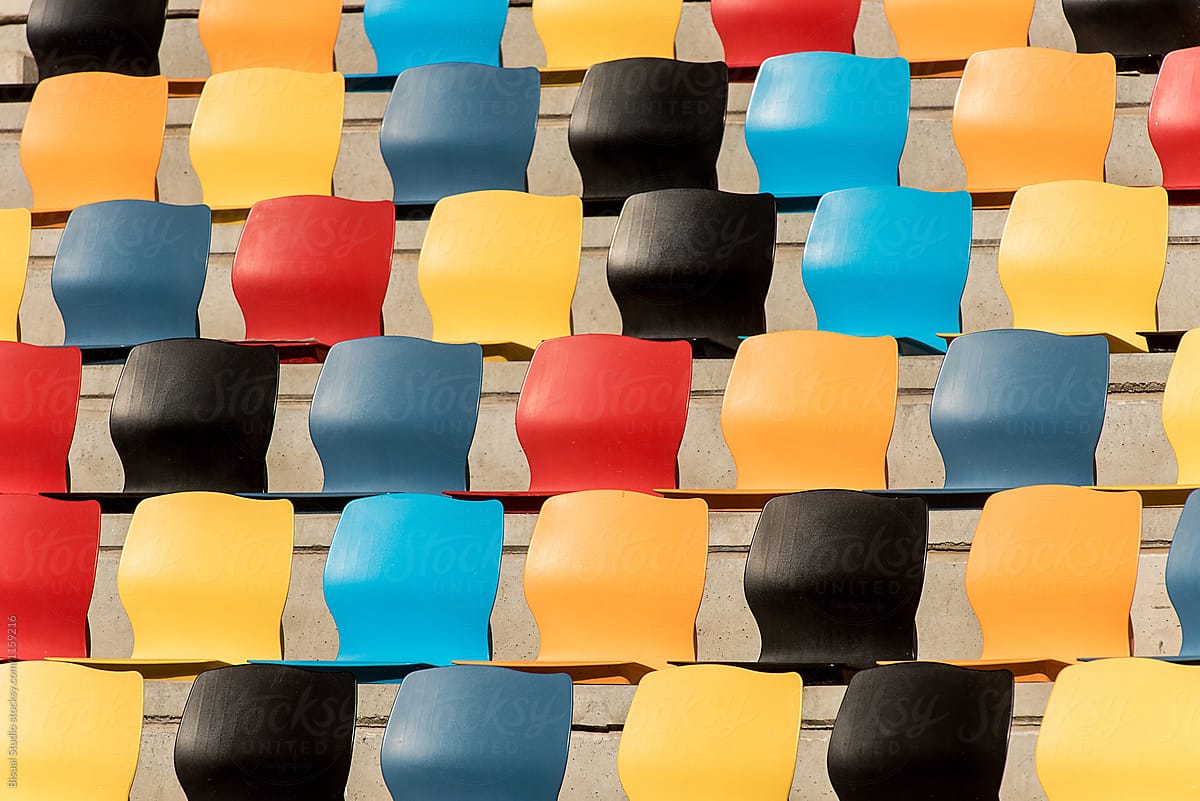 Multicolored individual seats in a grandstand