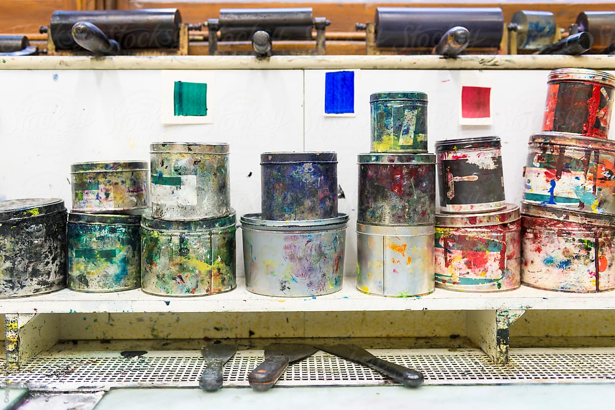 Traditional Printing Studio. Tins of paints and rollers used in the printing process.