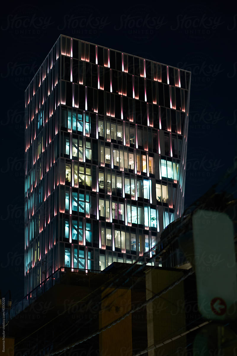 Illuminated apartment building at night