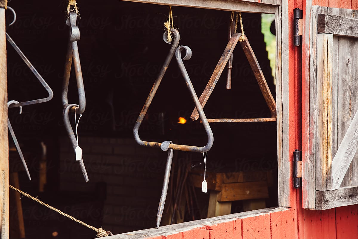 Iron dinner triangles calling bell at an old blacksmith shop