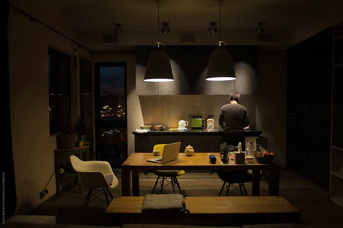 Man At A Kitchen At Night by Lyuba Burakova