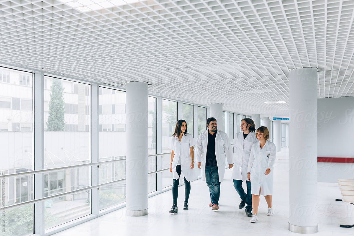 Medic team walking through a hospital corridor