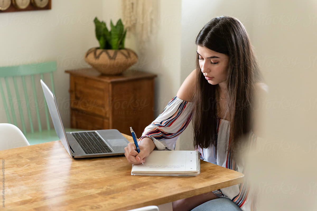 Teenage Girl Doing Homework By Stocksy Contributor Jamie Grill Atlas Stocksy