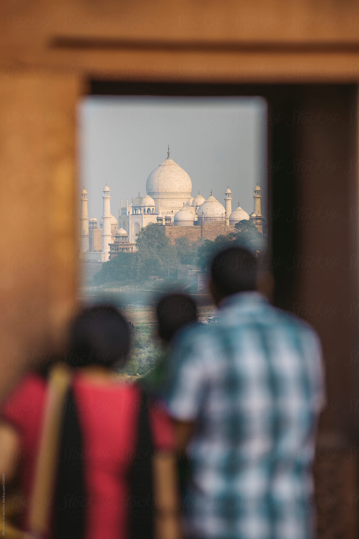 Indian Family Looking On Taj Mahal