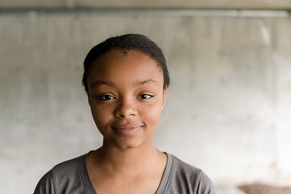 Happy Black Tween Girl by Stocksy Contributor Lea Jones - Stocksy