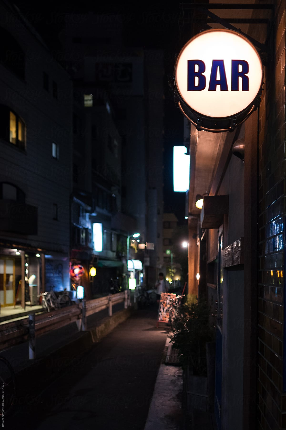 Neon Bar sign in street at night