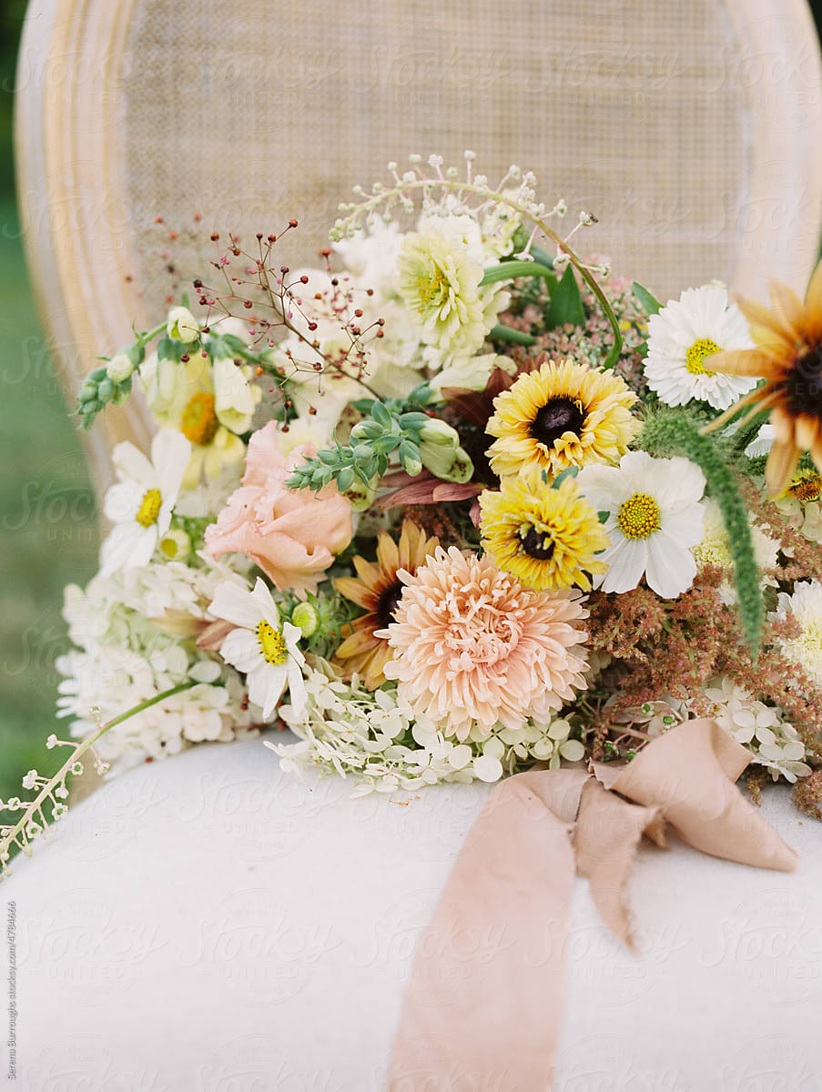 close up of a summery colorful bridal bouquet on a wedding day