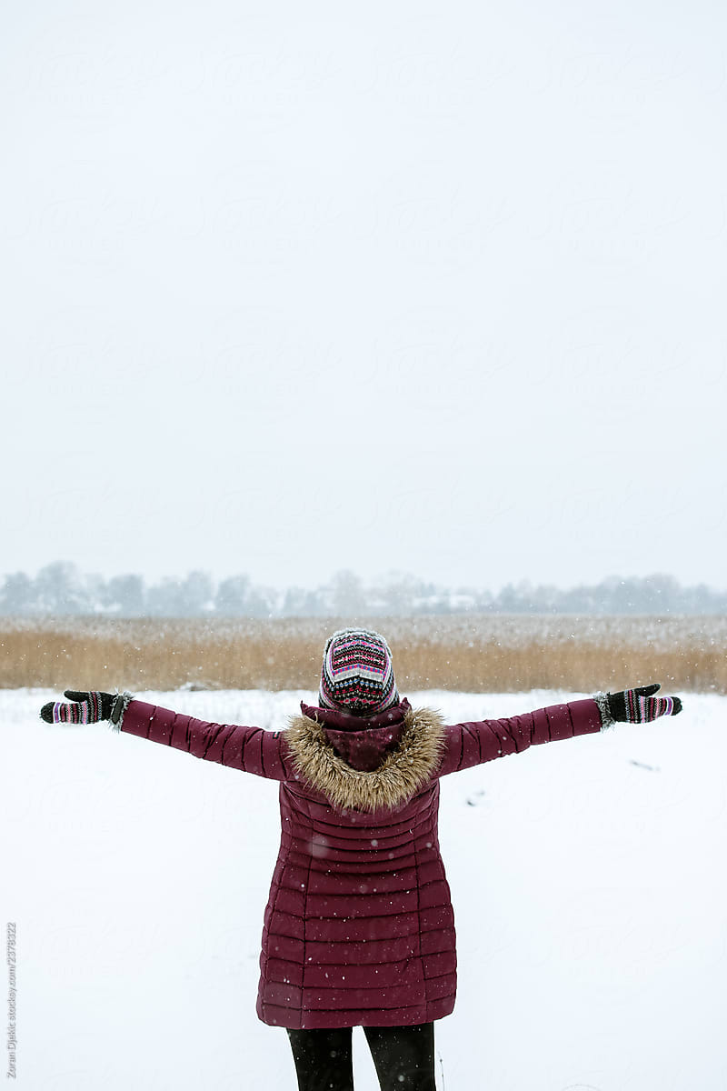 Woman On Snowy Path
