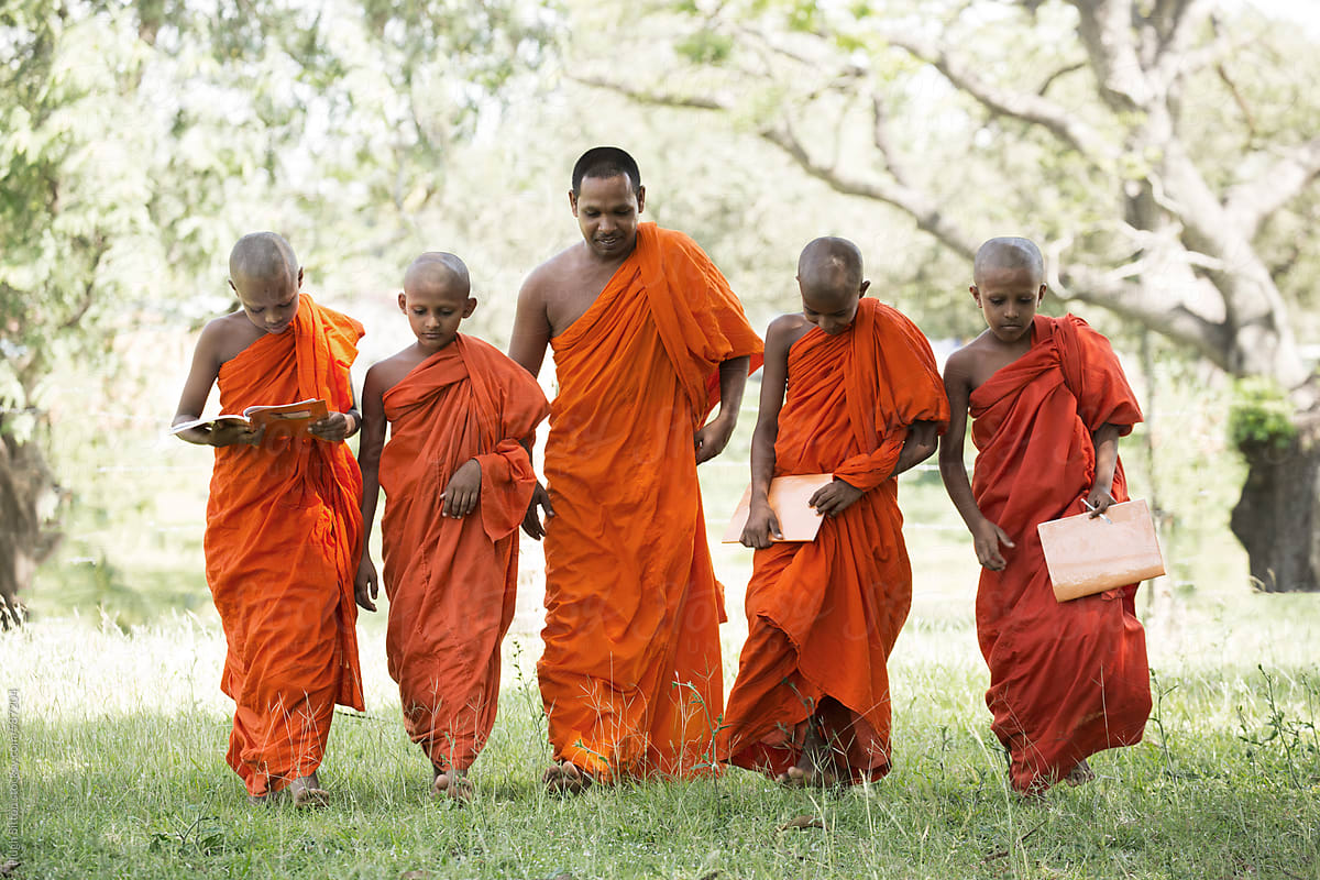 Buddhist monk teacher with students. Sri Lanka.