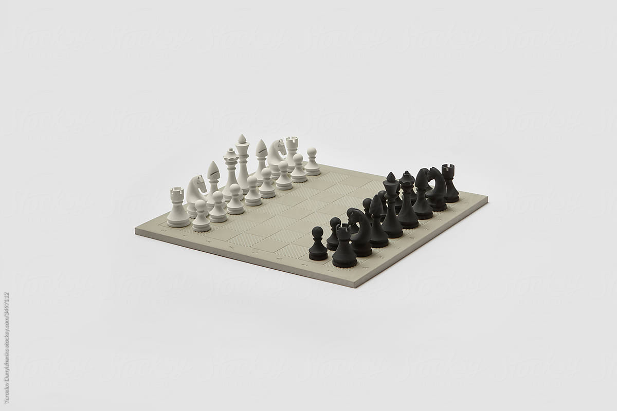 Lined up modern chessboard before a game.
