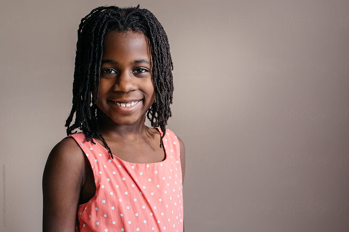 Smiling African American Girl In Rose Dress By Gabriel Gabi