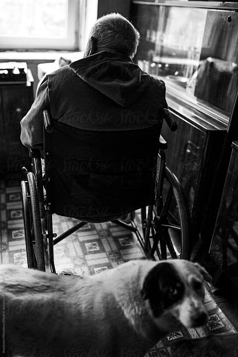 Physically disabled man sitting in his wheelchair