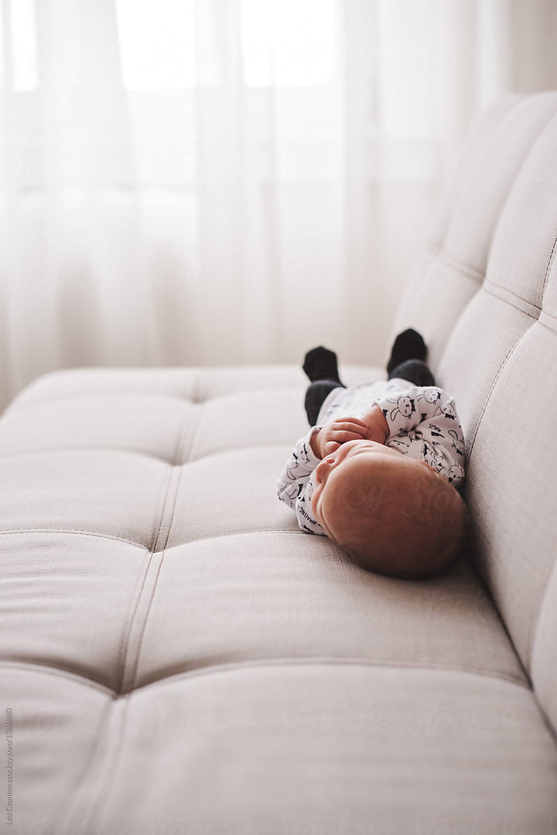 sleeping on sofa with baby