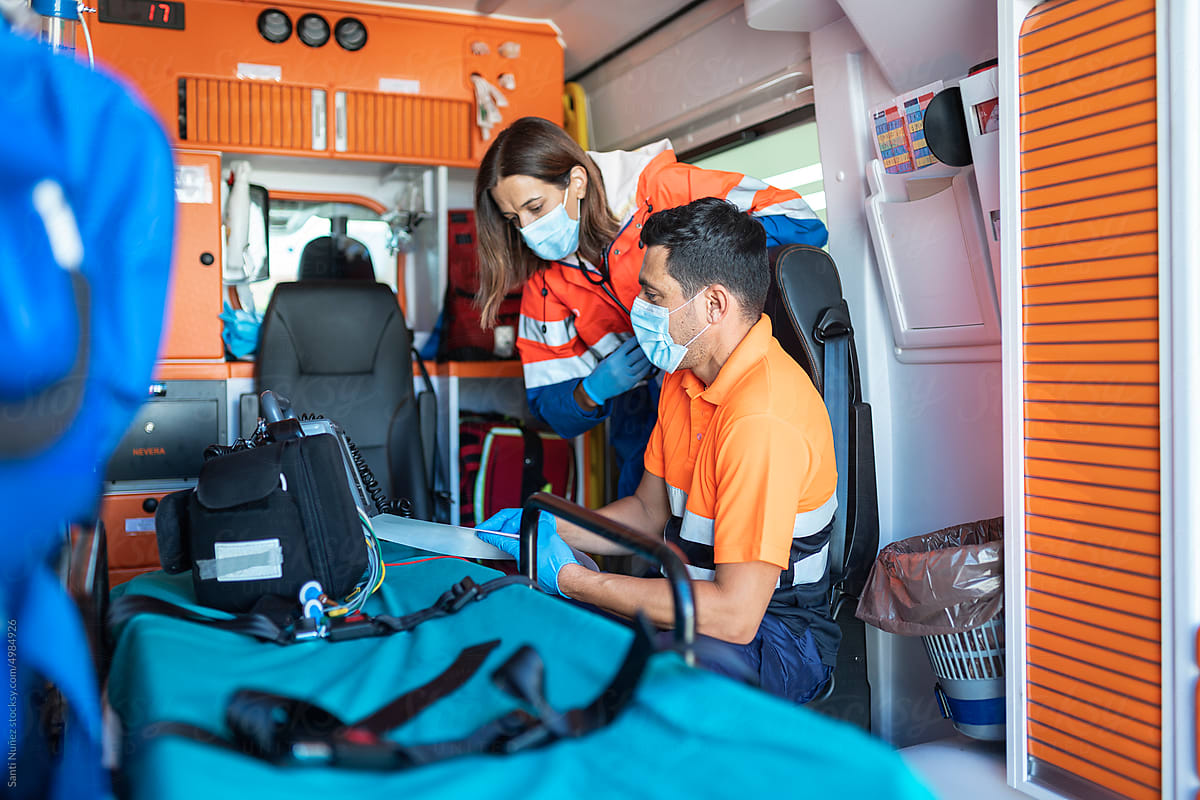 Paramedic Workers Inside an Ambulance