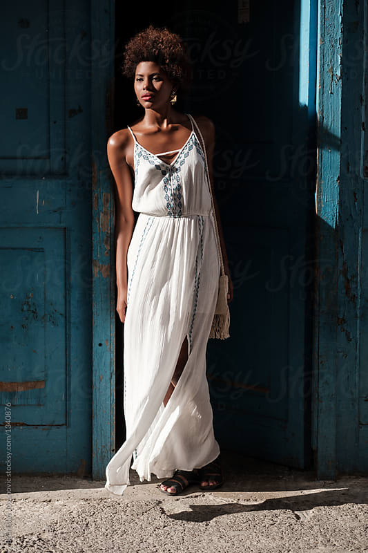 Beautiful African Woman Wearing White Dress" by Stocksy Contributor "B Krokodil" - Stocksy Beautiful African Woman Wearing White Dress" by Stocksy Contributor "B Krokodil" - Stocksy