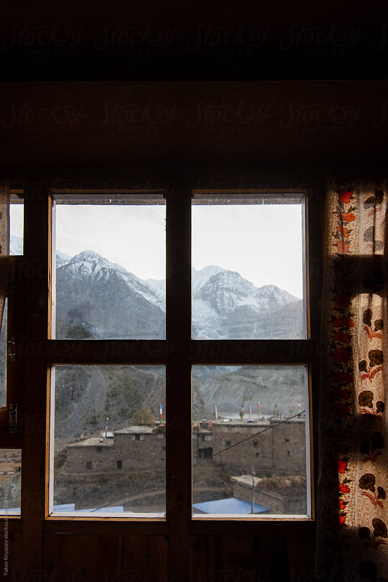 Himalaya mountains seen through the window