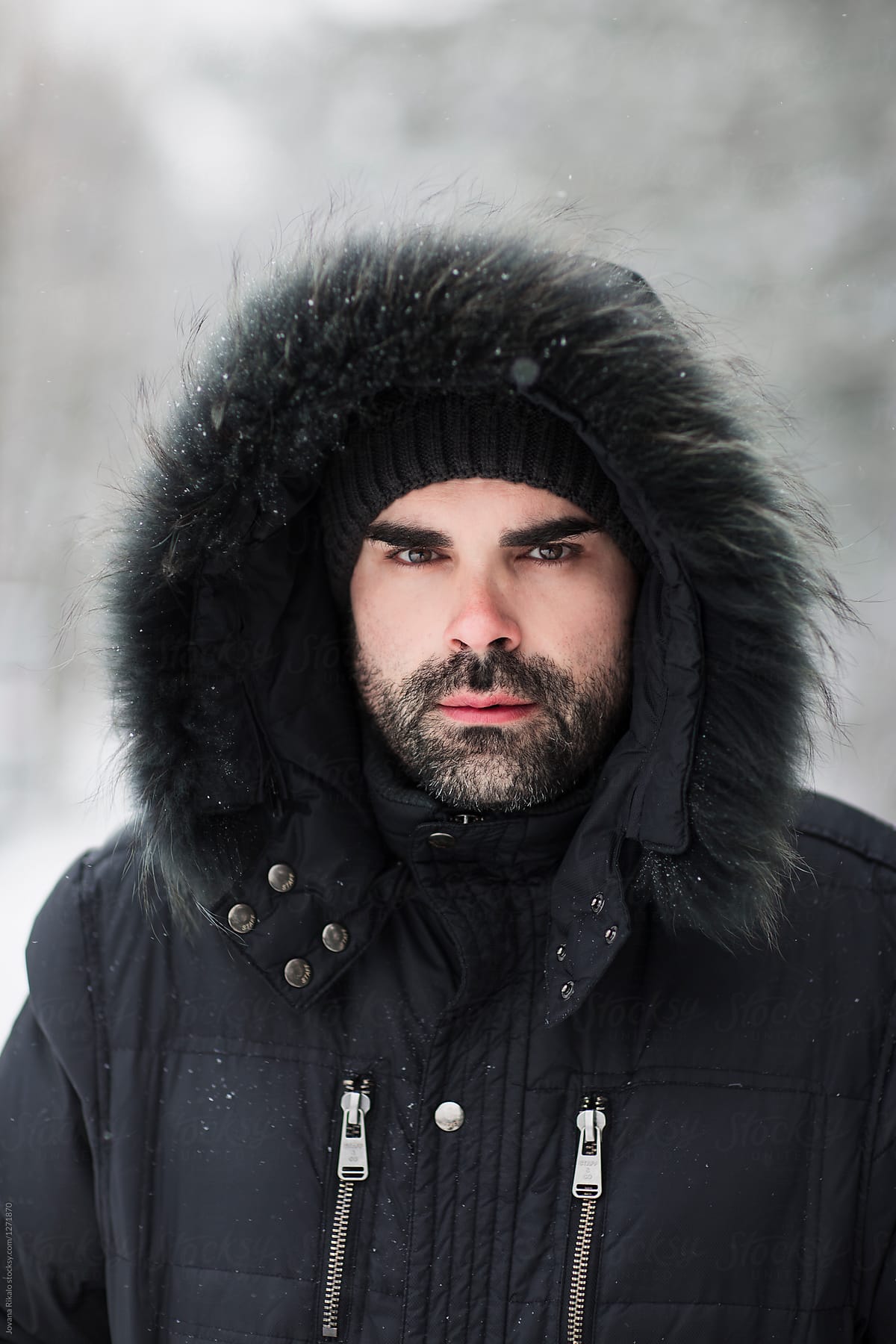 Winter portrait of a bearded man