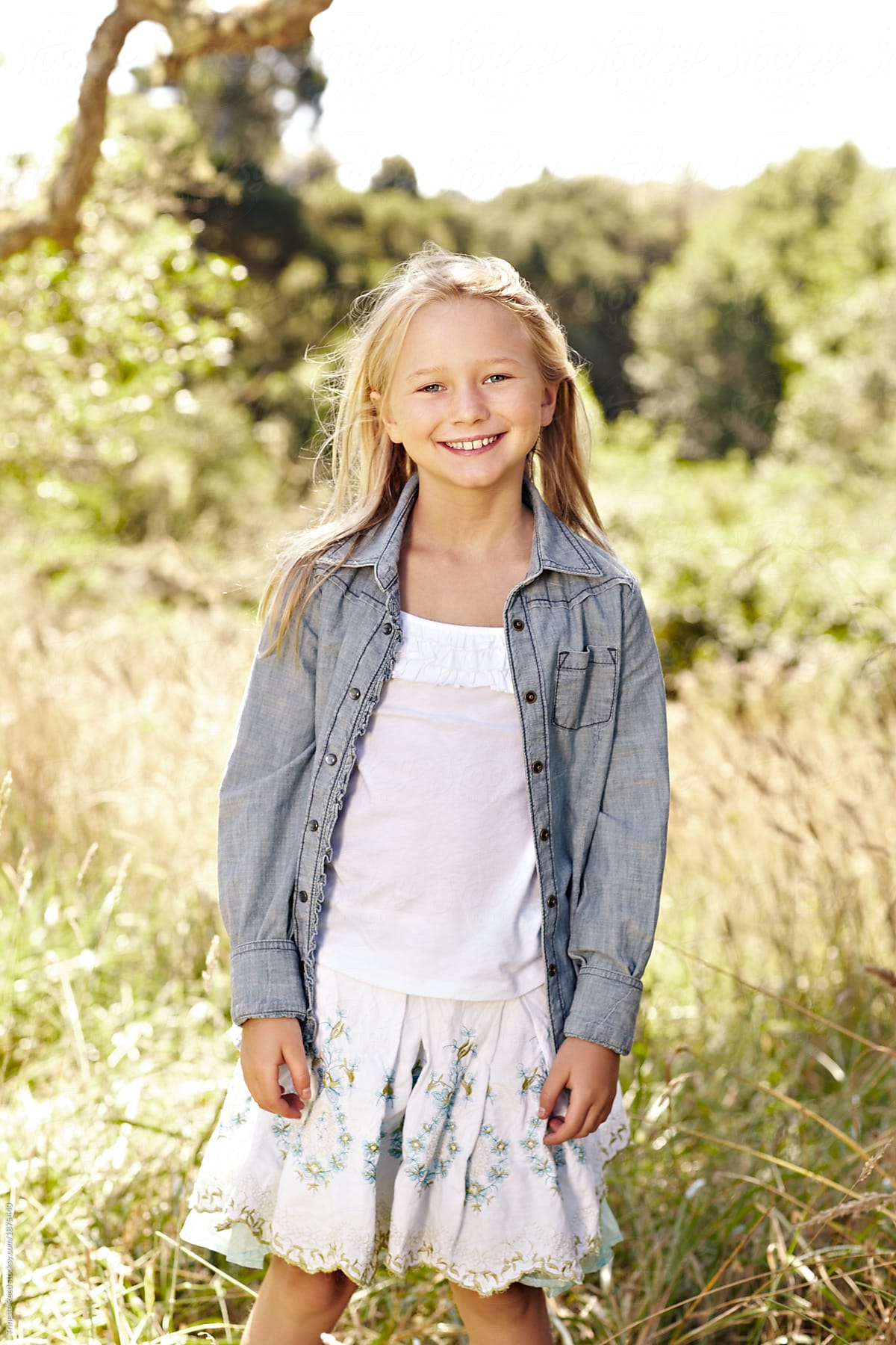 Portrait Of Little Girl With Blonde Hair Outdoors ...
