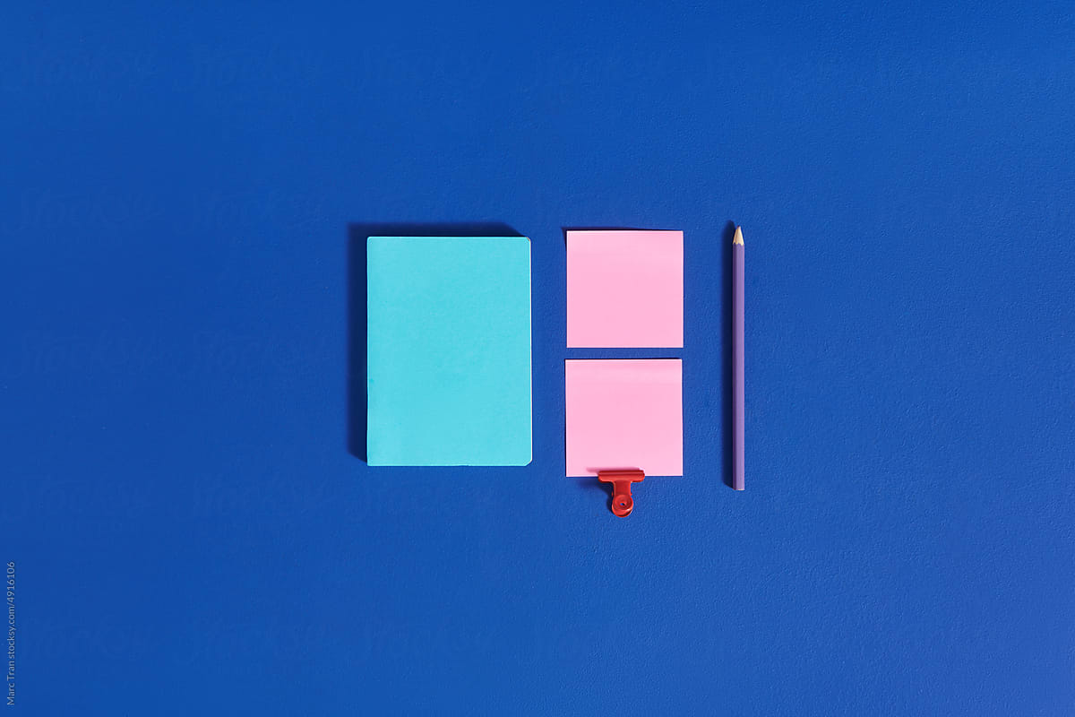 Colorful stationery isolated on blue background.