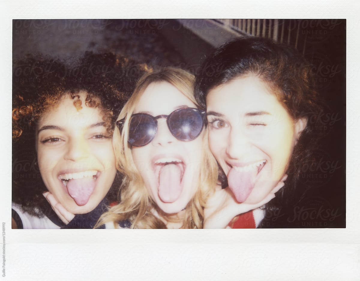 Girlfriends Showing Tongues At Camera In Close Up By Stocksy Contributor Guille Faingold
