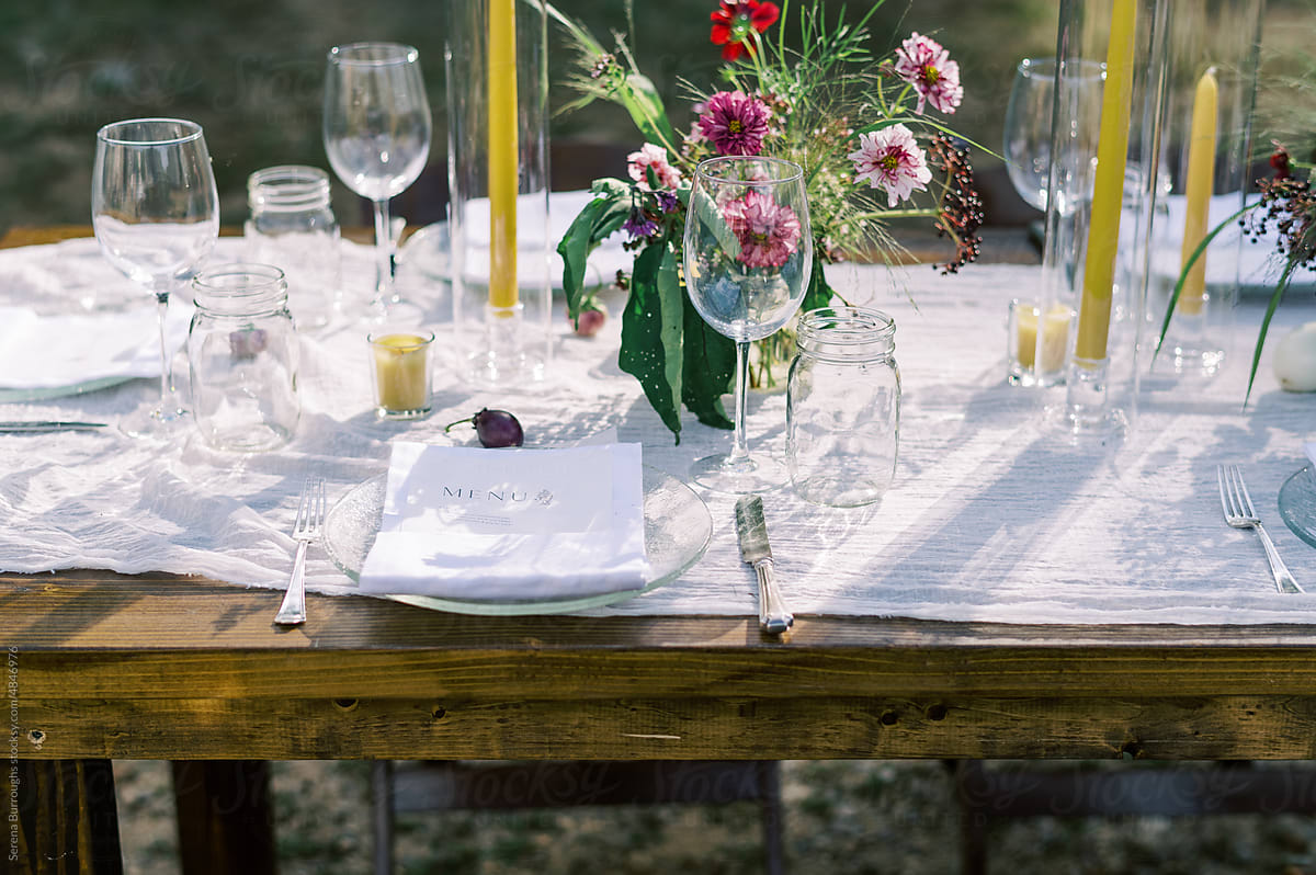 View of an event table with decor and flower arrangements