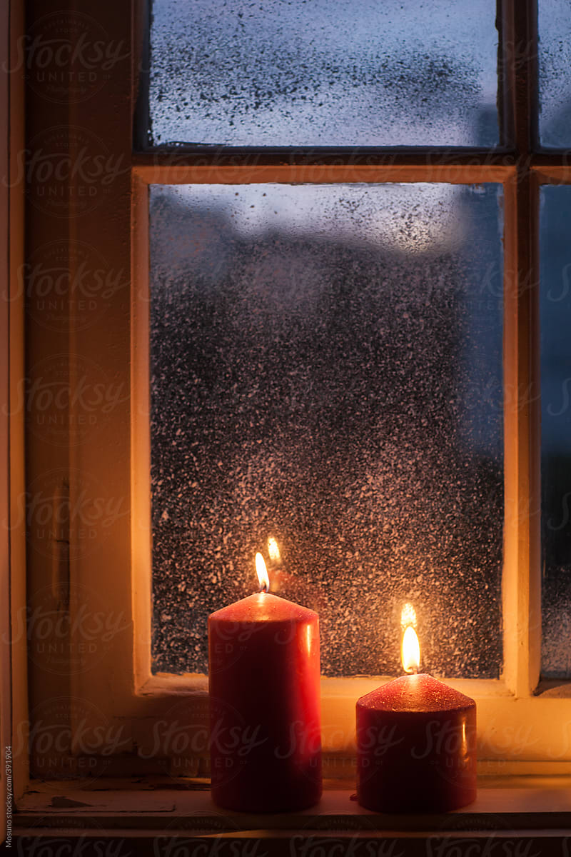 Candles in the Window at Christmas Eve