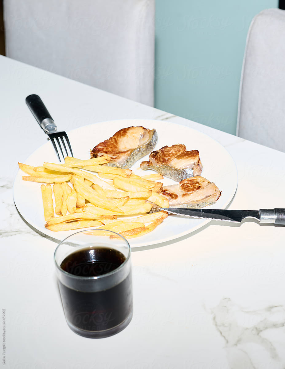 Served fish and fries with coke