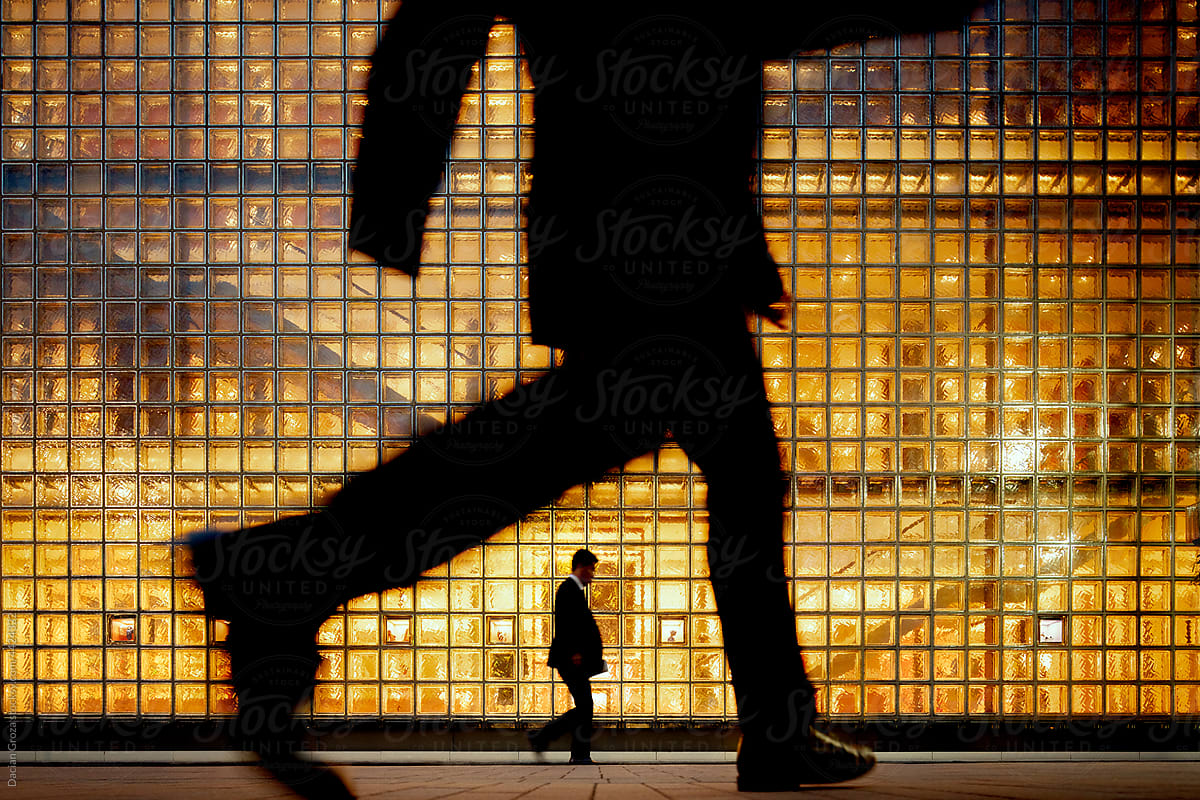Dynamic silhouettes against bright orange background
