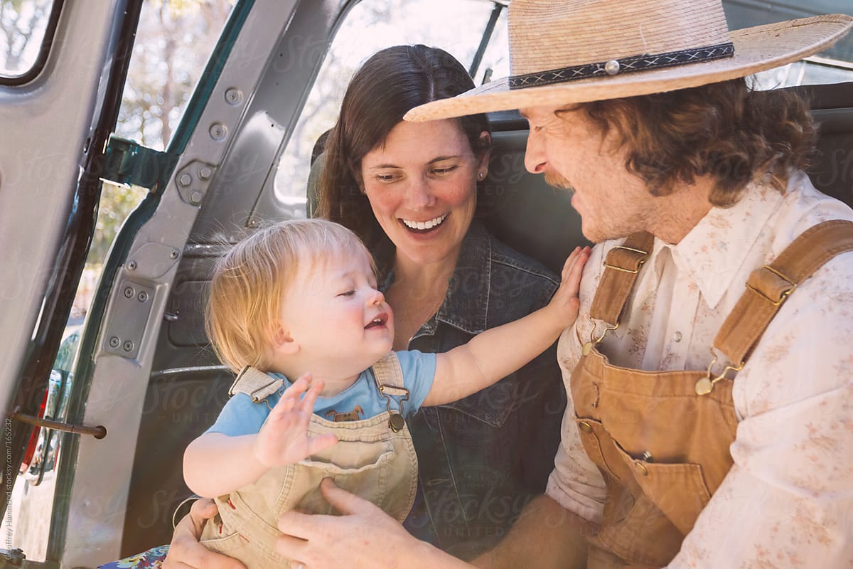 Happy Country Family in Back of Truck