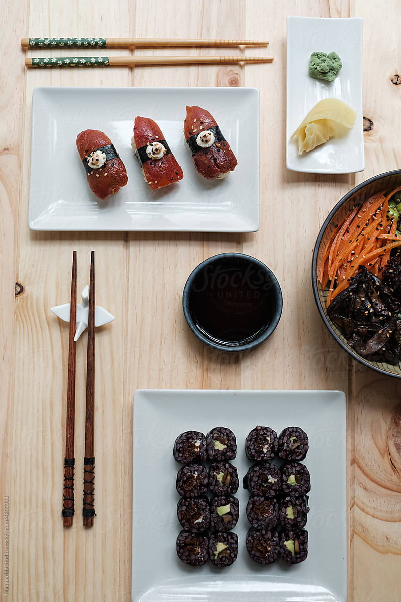 Sushi rolls and poke bowl