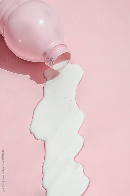spilled milk from pink bottle on pink background,  food, milk,minimal,diet,breakfast